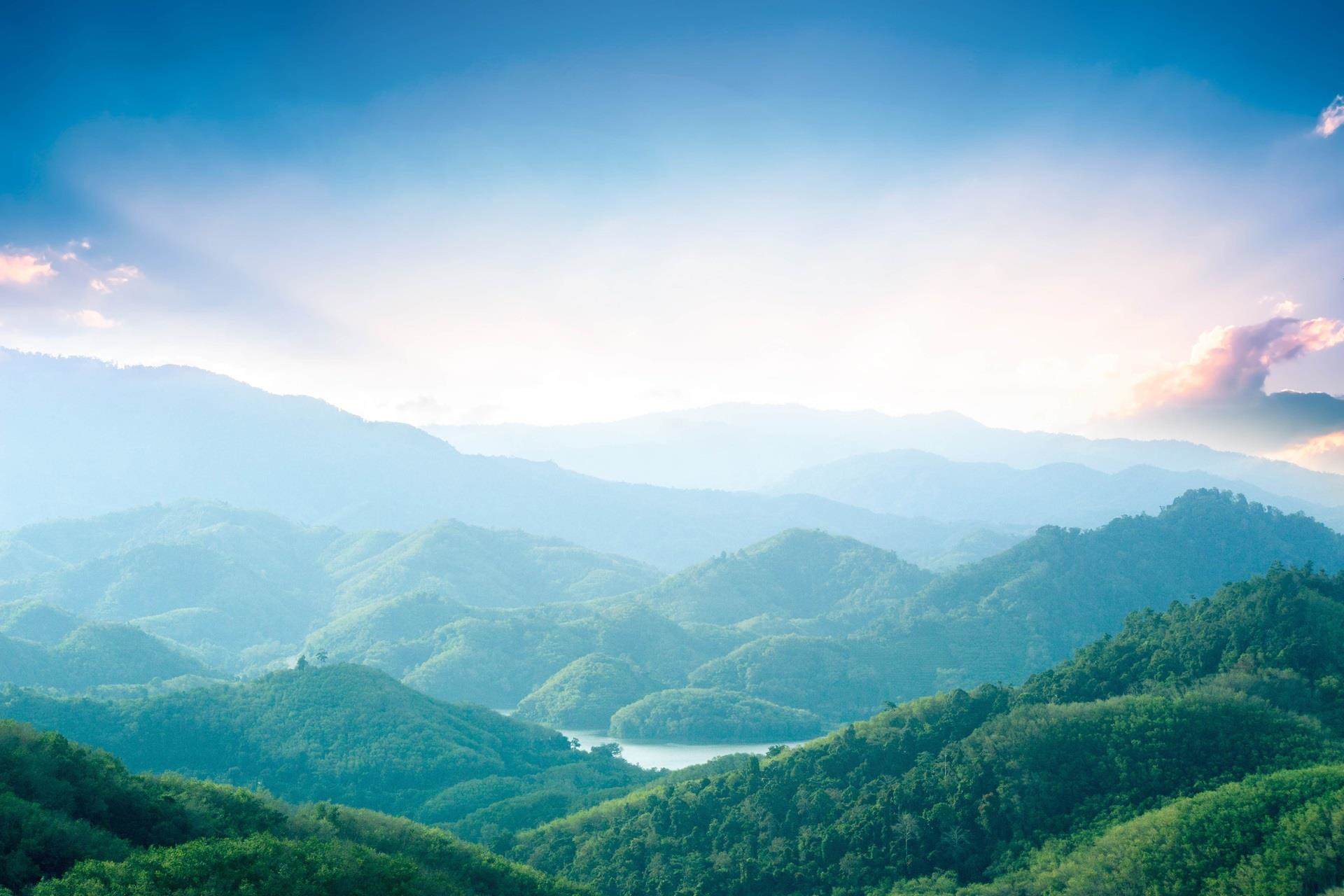 scenic view overlooking mountains and forests
